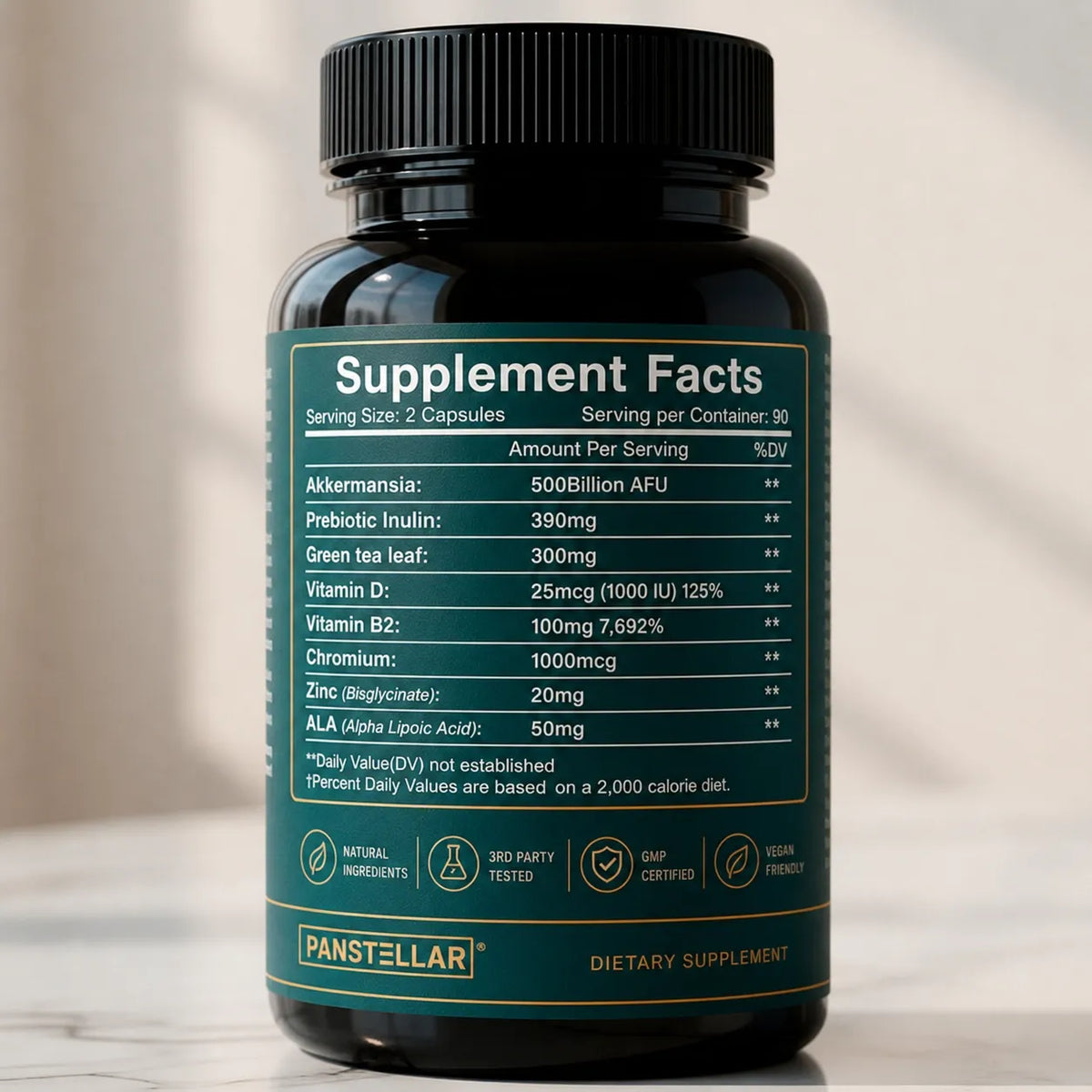 Panstellar dietary supplement bottle with a black ribbed cap and a dark teal label showing Supplement Facts, photographed on a light marble surface with a soft neutral background.