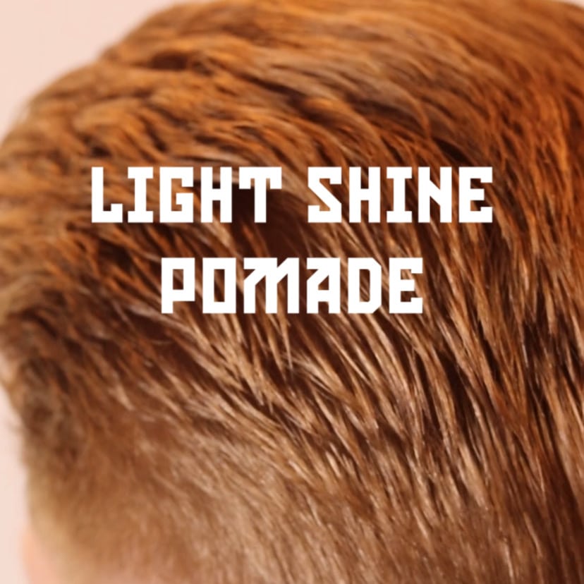 Close-up of brown hair with 'Light Shine Pomade' text overlay