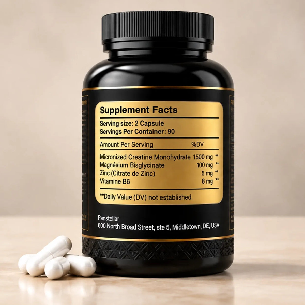 A black supplement bottle with a gold label showing supplement facts, with three white capsules resting in front on a light beige surface.