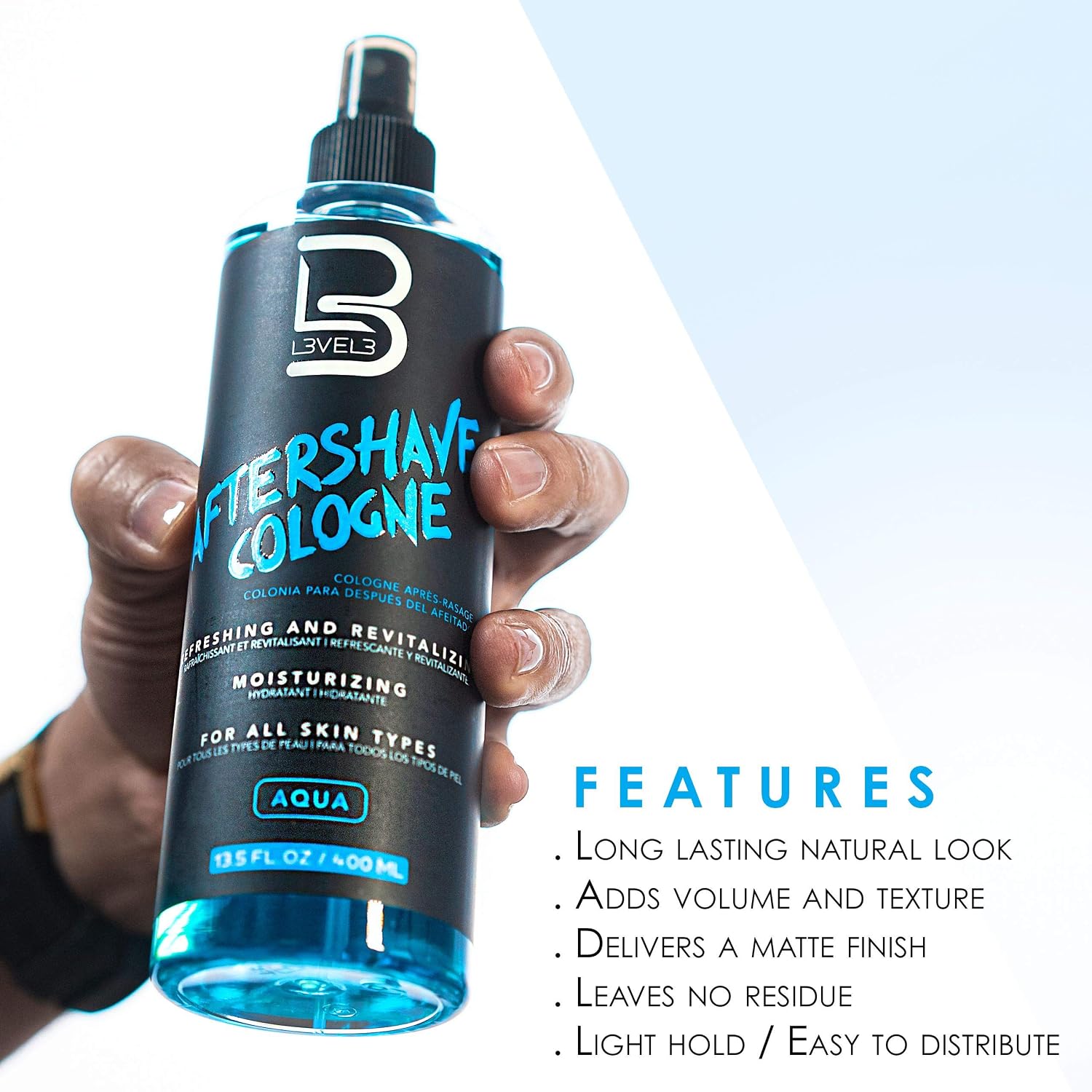 Bottle of Level 3 Aftershave Colonia held by a hand with product features listed.