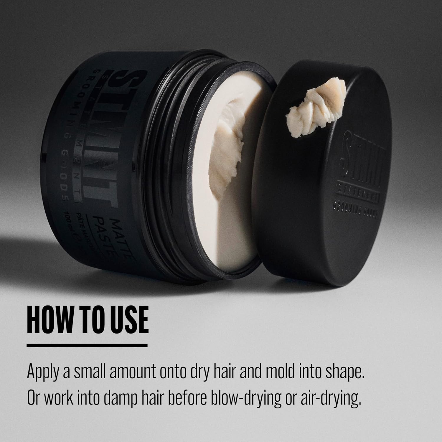 A black jar of STUETT Matte Paste with its lid off, showing a dollop of off-white cream product inside. Below the jar is a 'HOW TO USE' text overlay with instructions on how to apply the hair product.