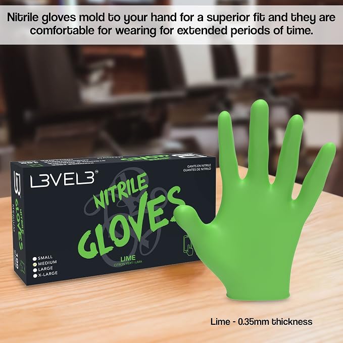 Green nitrile glove next to its packaging on a wooden surface with text about glove comfort and fit.